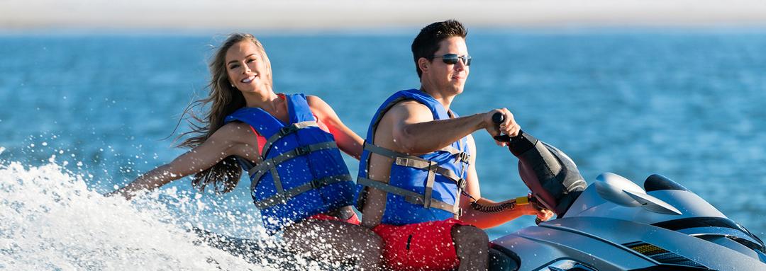 Couple riding a jet ski at Lake Lewisville