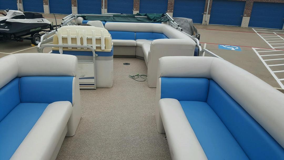 Inside a blue pontoon boat rental at Lake Lewisville