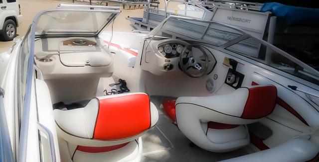 Driver's view of a red speed boat rental at Lake Lewisville