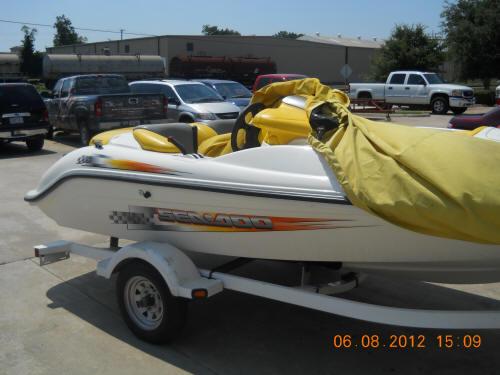Side view of a yellow speed boat rental at Lake Lewisville