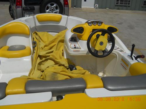 Storage space in a yellow speed boat rental at Lake Lewisville
