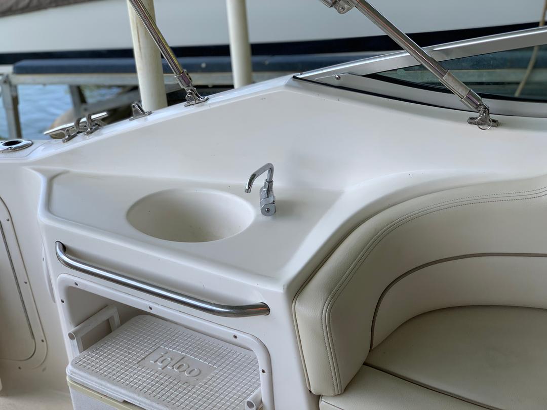 Faucet inside the white mini yacht cruiser boat rental at Lake Lewisville