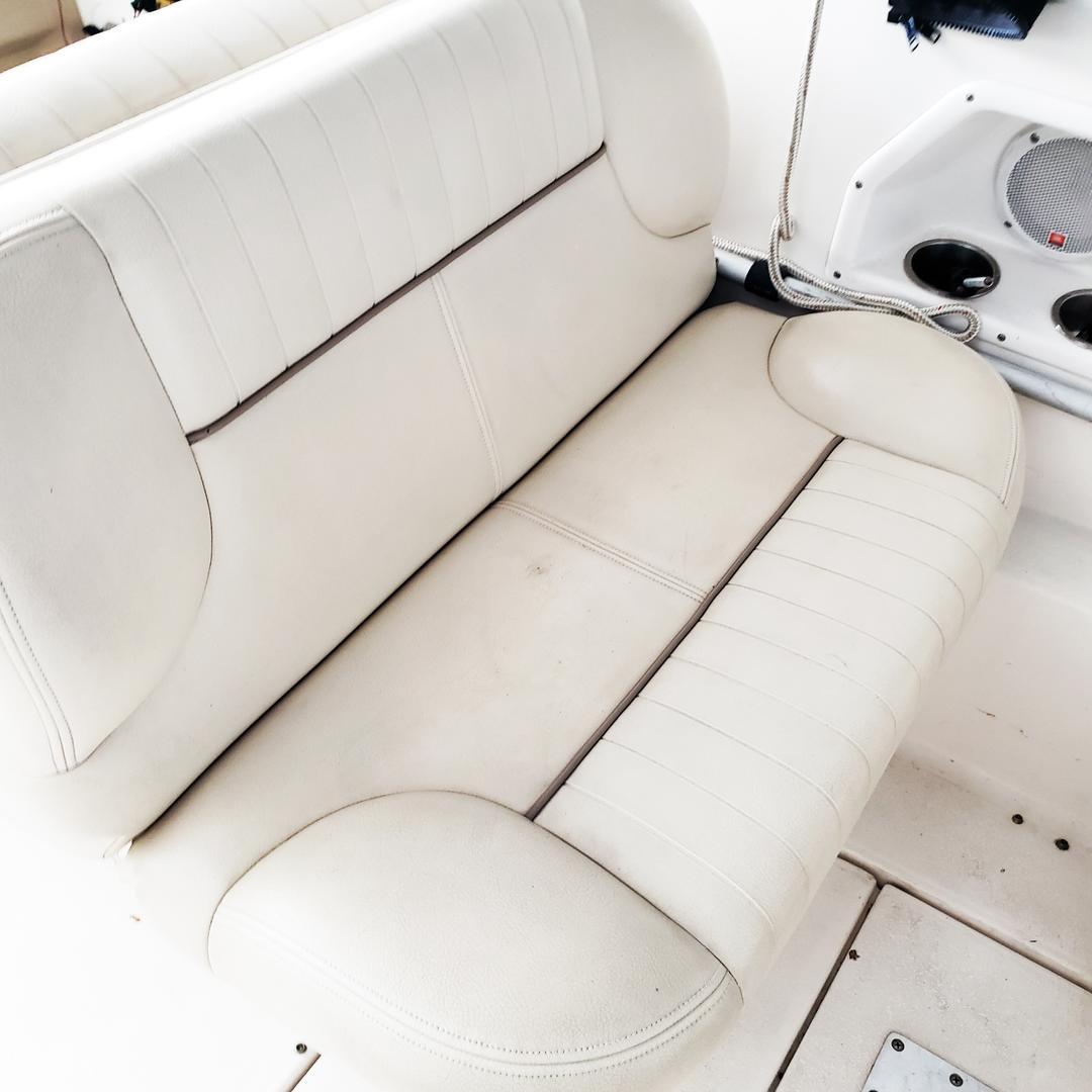 Seating area in the white mini yacht cruiser boat rental at Lake Lewisville